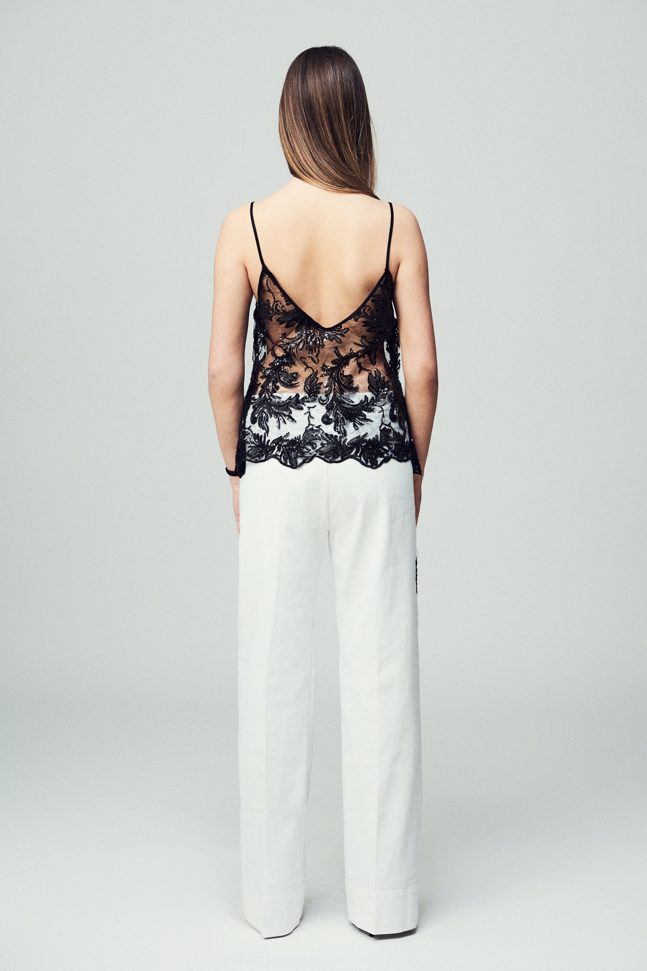 Top Alba in paillettes e pizzo nero