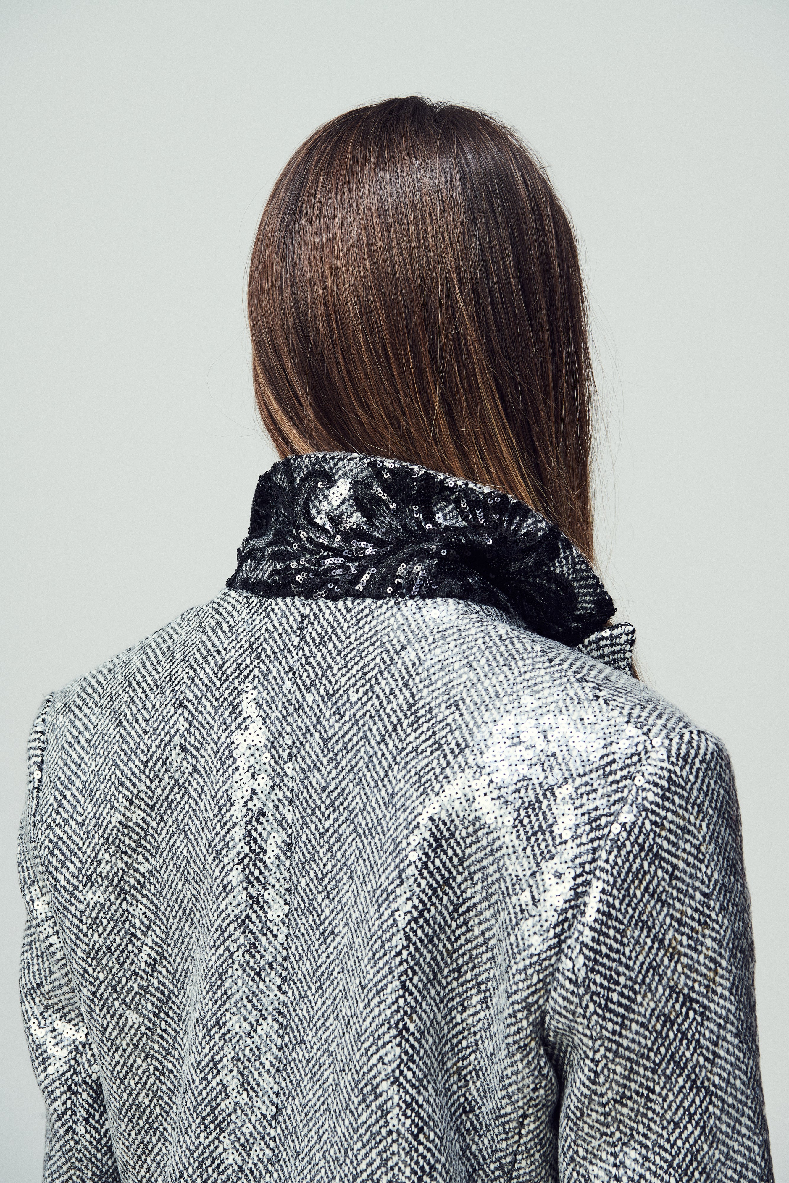 Giacca Como in paillettes su spigato bianco e nero